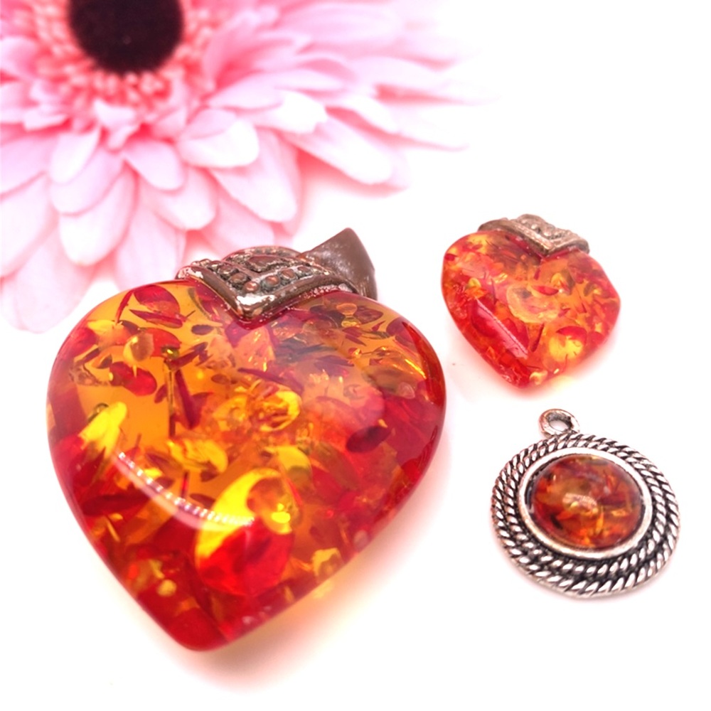 Lot of 3 Amber pendants
